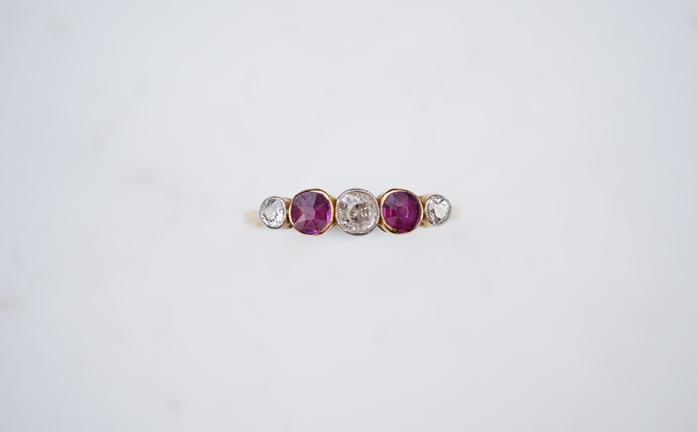 A ruby and diamond five-stone ring, early 20th century